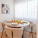Urban Terrace & Stylish Living Spaces By Hostwise Daire Porto